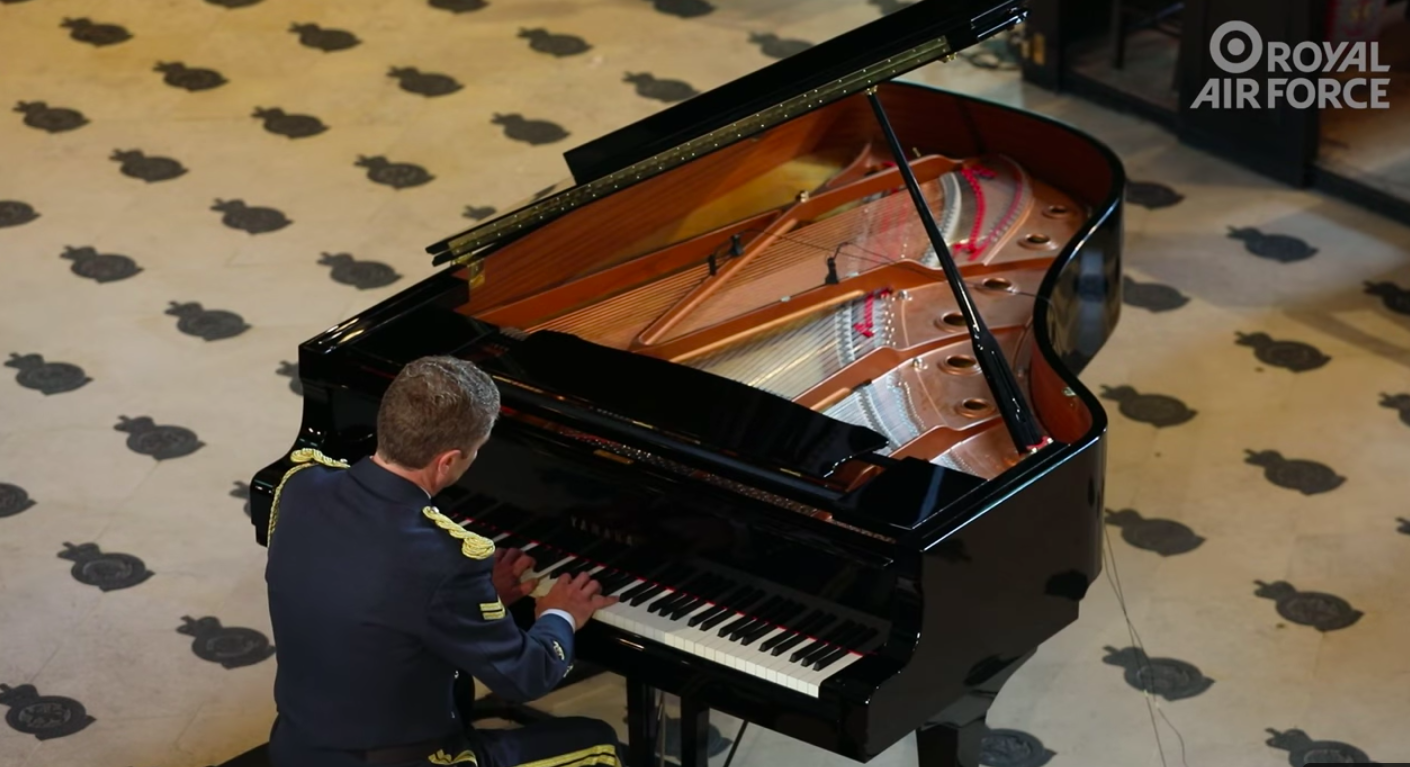 Piano being played by Corporal McCarthy.. 
